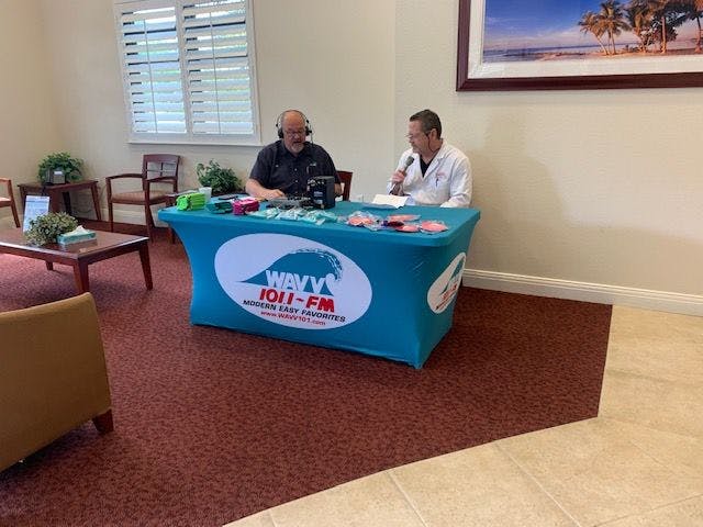 Harris Dermatology prioritizes skin check events year-round and discuss sun safety with a local radio host from WAVV 101.1 FM. Image Credit: Harris Dermatology