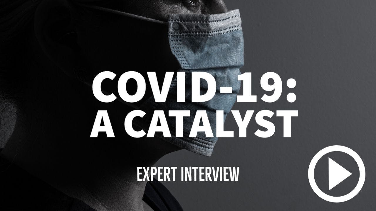 Image of man in a surgical mask with writing "COVID-19: A Catalyst - Expert Interview"