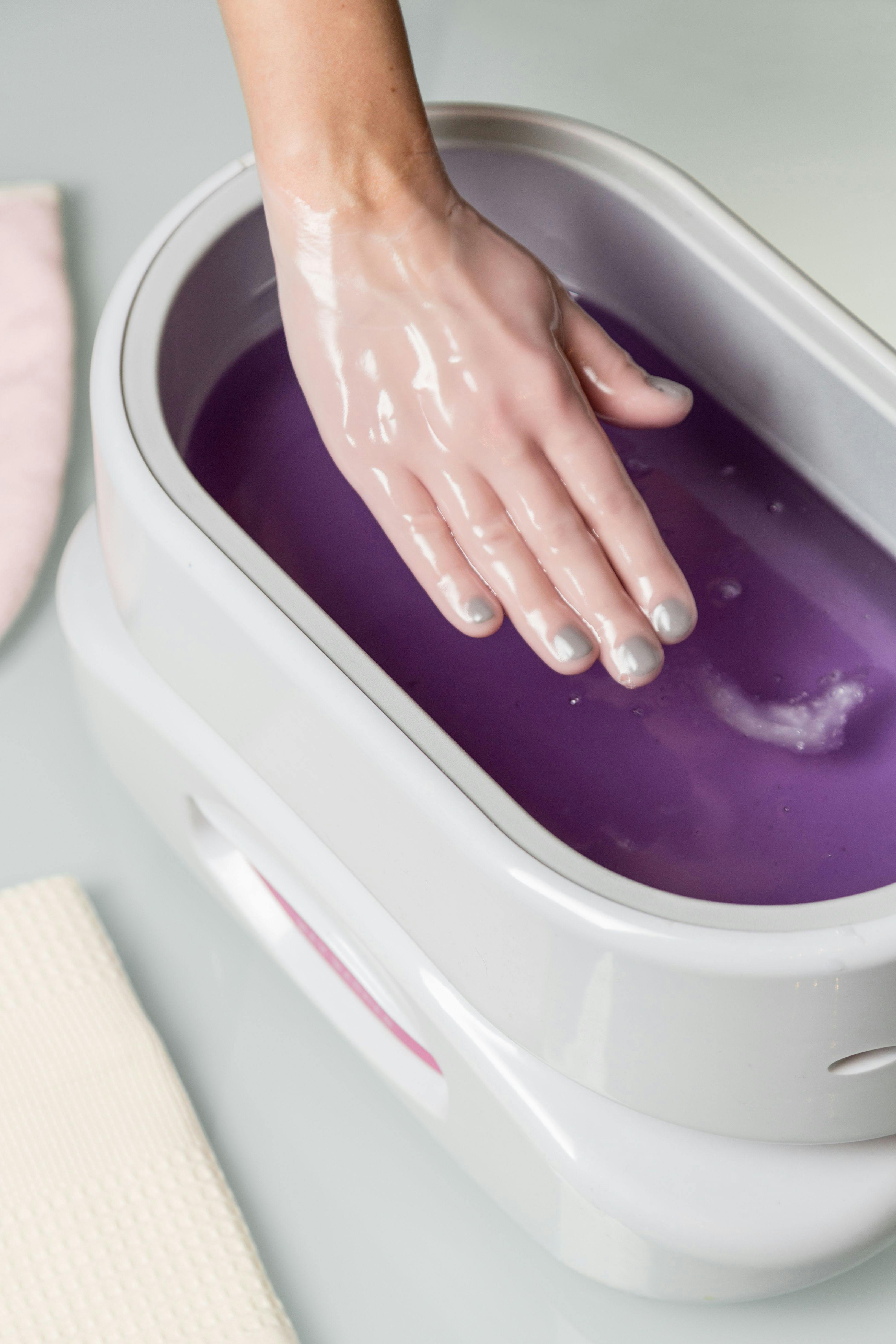 A paraffin wax bath for hands can lock in moisture for patients if used 1-2 times a week. Volodymyr Herasymov/Adobe Stock